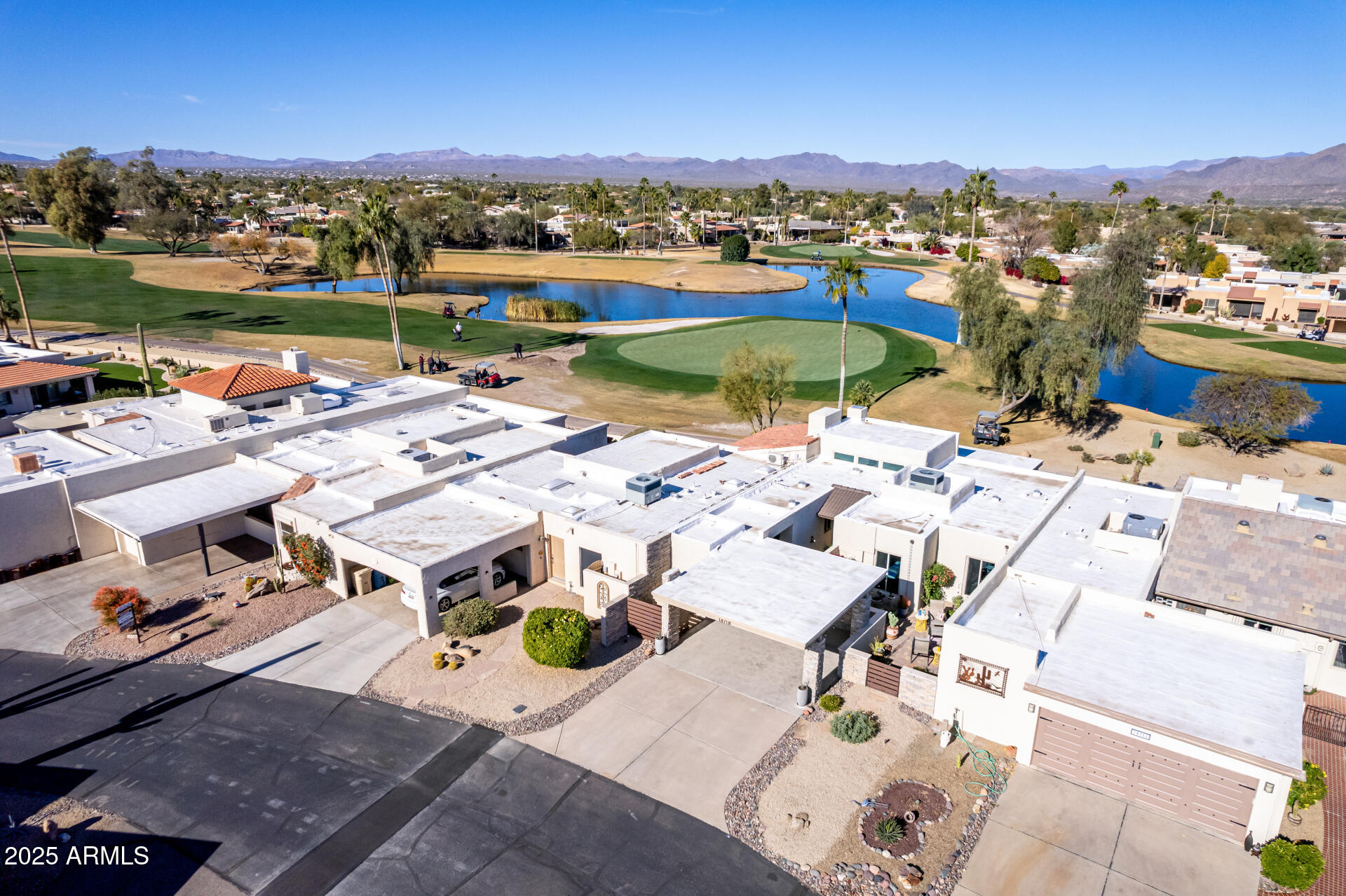 18718 East Rio Lane Rio Verde, AZ 85263 - Photo 40 of 59 an aerial view of a swimming pool with outdoor seating