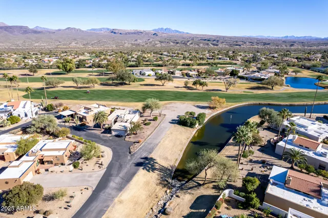 a view of a city with a lake
