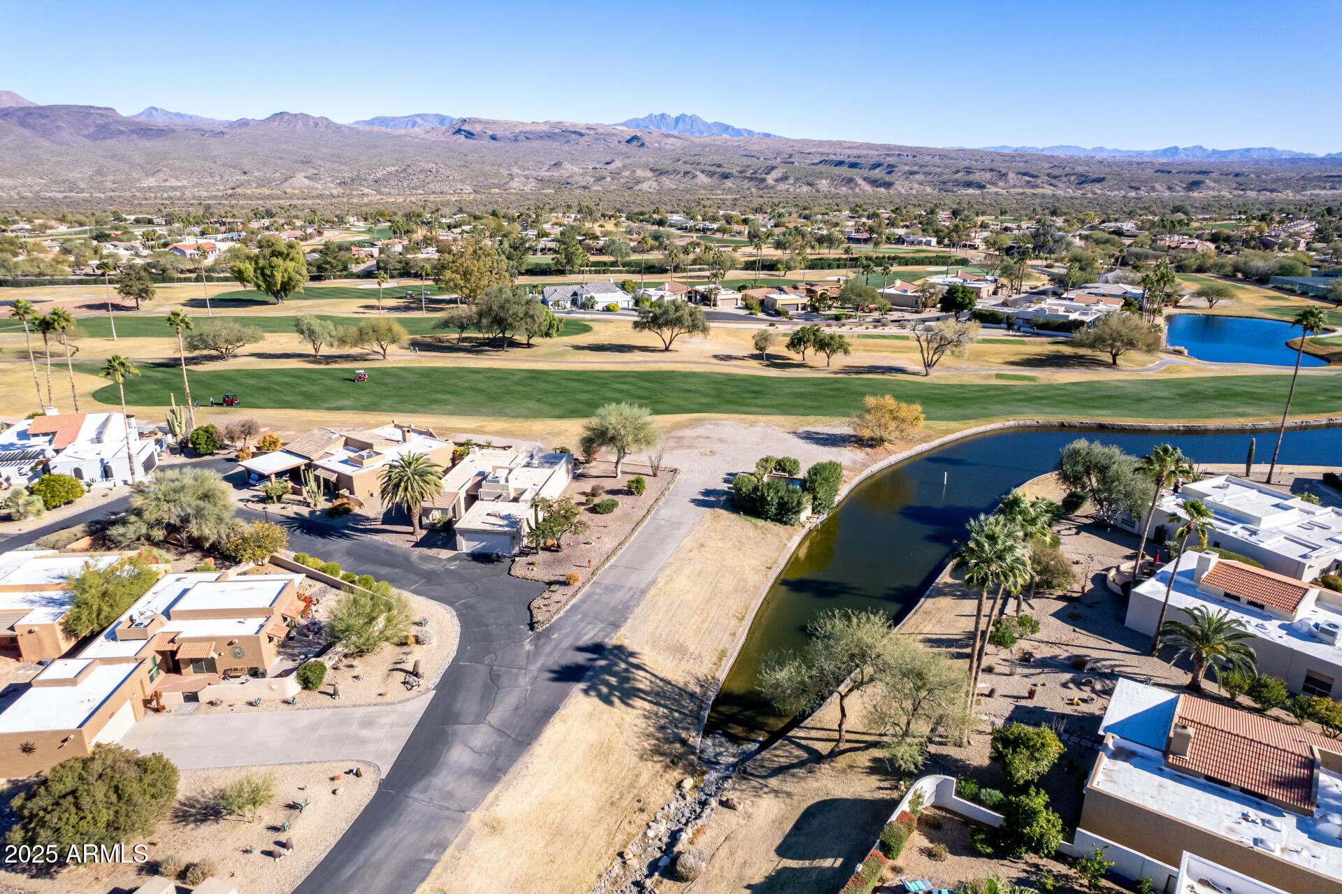 18718 East Rio Lane Rio Verde, AZ 85263 - Photo 43 of 59 an aerial view of a house with a lake view