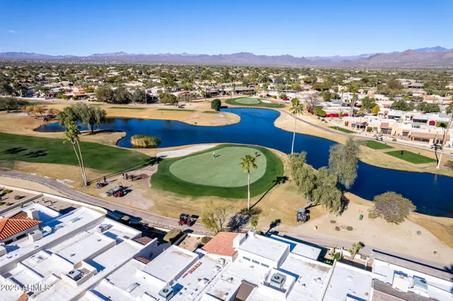 a view of a workspace with furniture and a livingroom