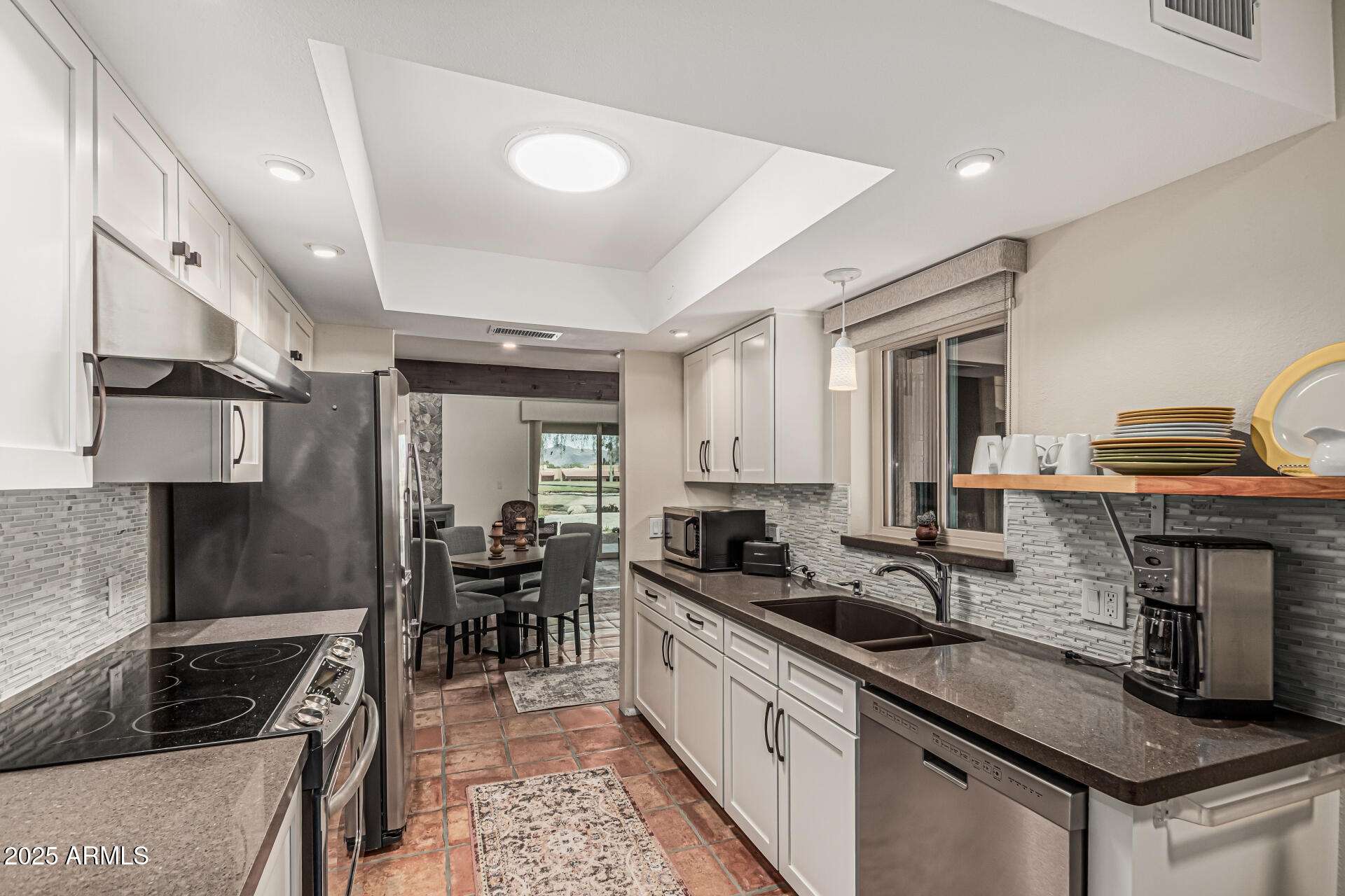 18718 East Rio Lane Rio Verde, AZ 85263 - Photo 10 of 59 a kitchen with sink stove and cabinets