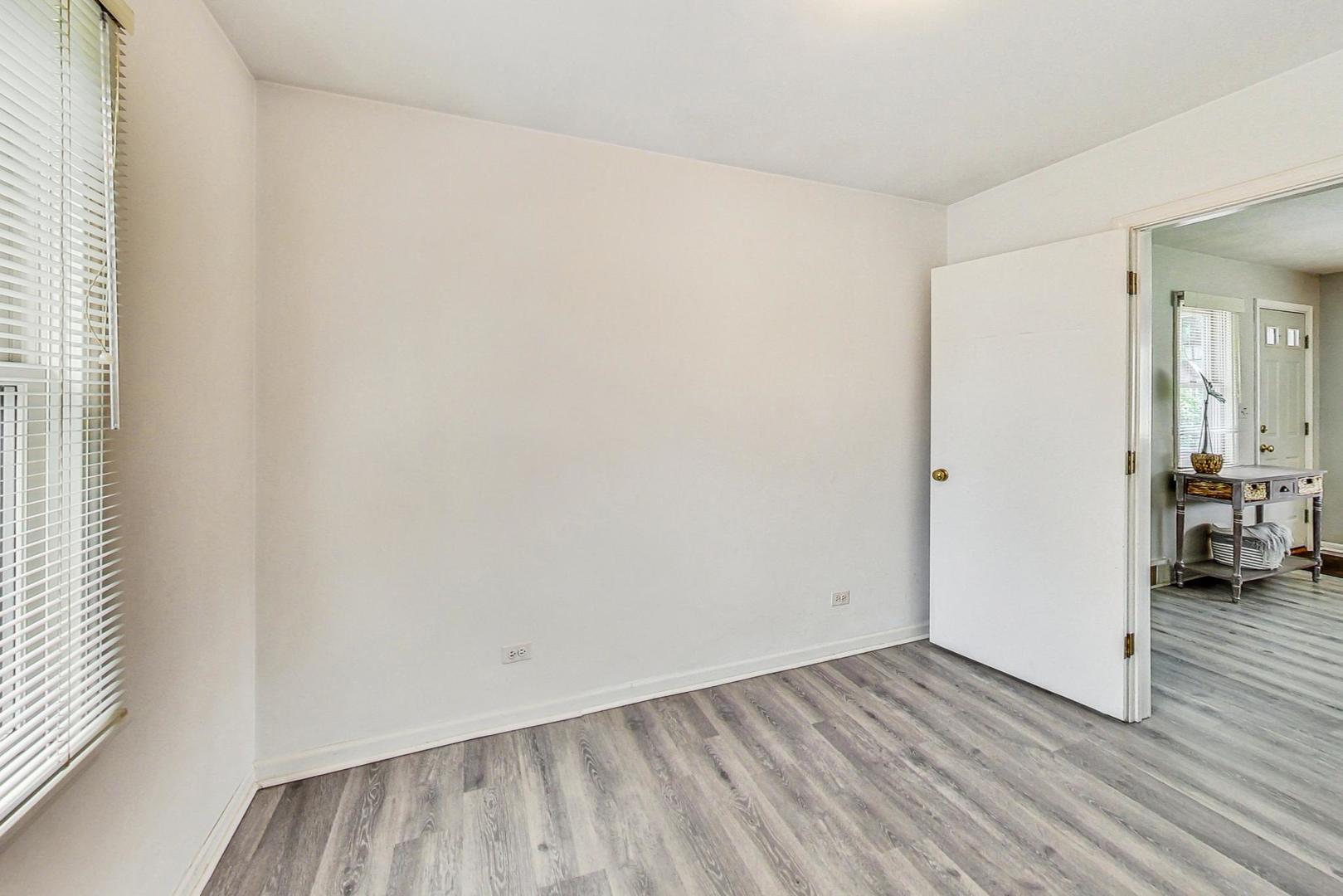 1010 Aurora Way Wheaton, IL 60189 - Photo 23 of 37 a view of a room with wooden floor