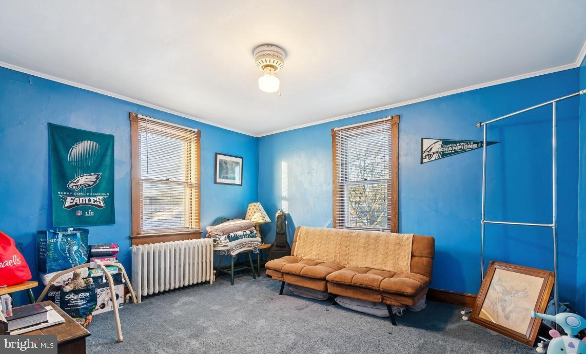 361 Democrat Road Gibbstown, NJ 08027 - Photo 10 of 12 Vibrant blue room with cozy charm.