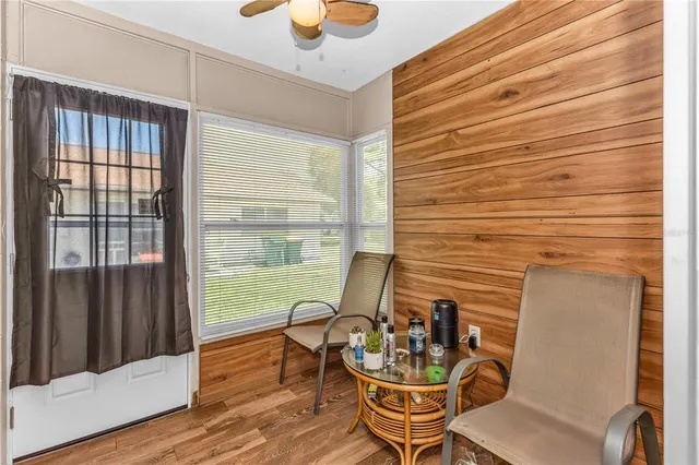 a room with furniture and wooden floor