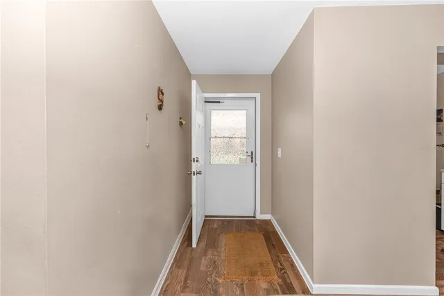 a view of hallway with closet