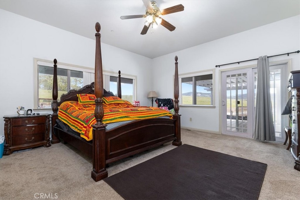 67911 Jolon Road Lockwood, CA 93932 - Photo 22 of 29 a bedroom with a bed and wooden floor