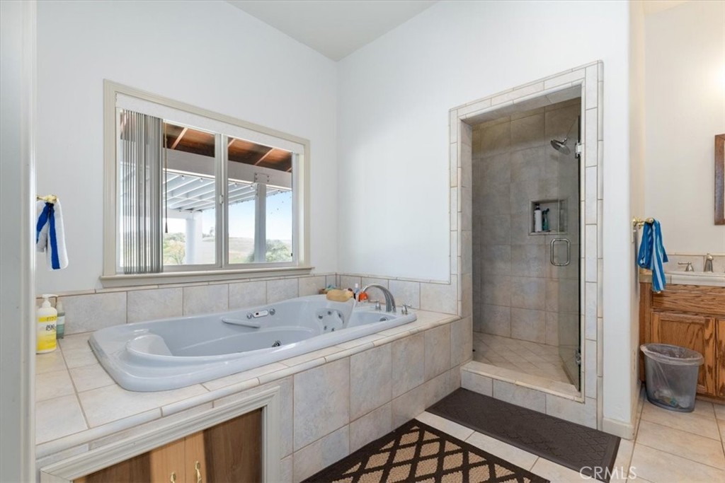 67911 Jolon Road Lockwood, CA 93932 - Photo 23 of 29 a bathroom with a sink a toilet and shower