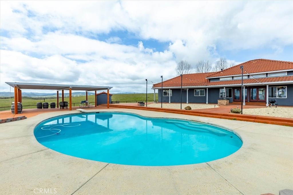 67911 Jolon Road Lockwood, CA 93932 - Photo 27 of 29 a view of a swimming pool with a patio