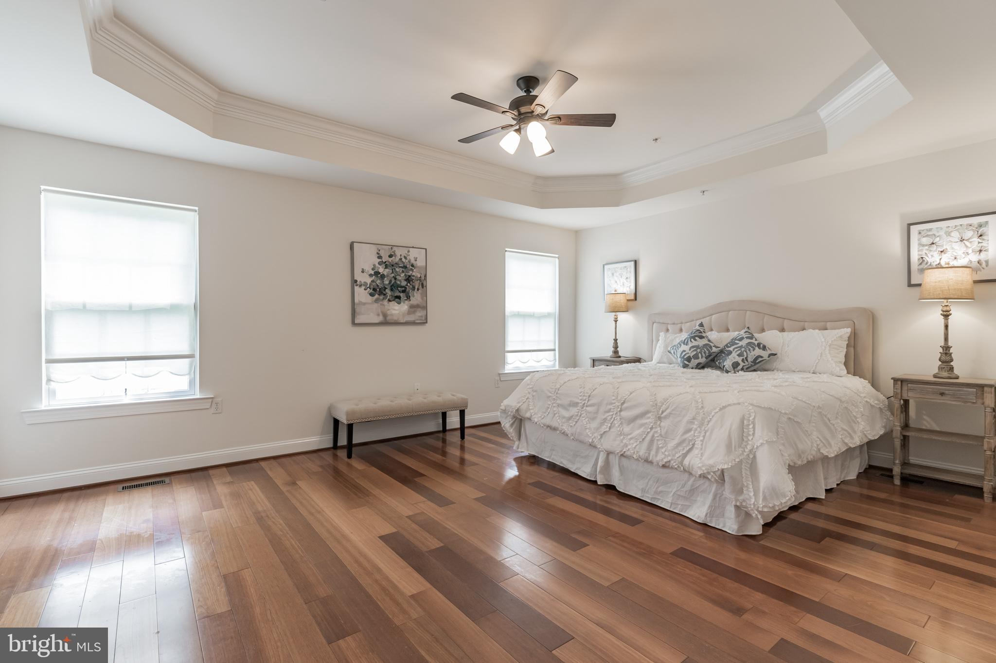 14207 Alderton Road Silver Spring, MD 20906 - Photo 22 of 50 Master bedroom with cherry hardwood flooring