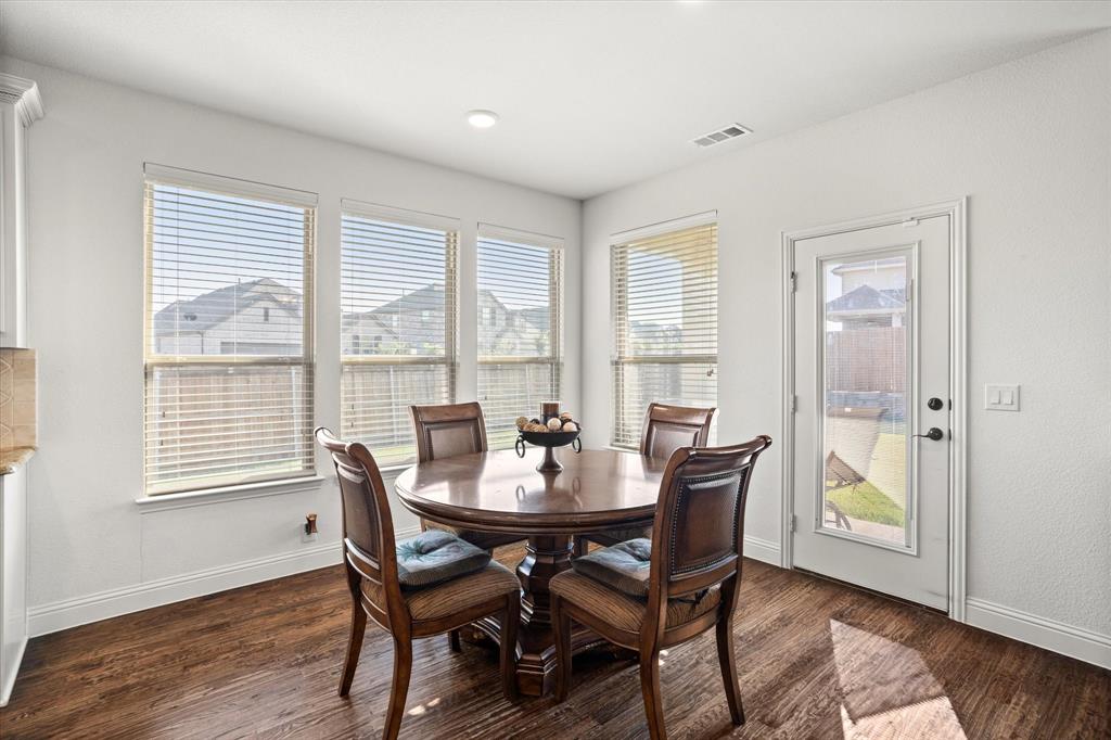 1814 Chadwick Lane Forney, TX 75126 - Photo 16 of 40 Dining area with dark wood-type flooring and recessed lighting