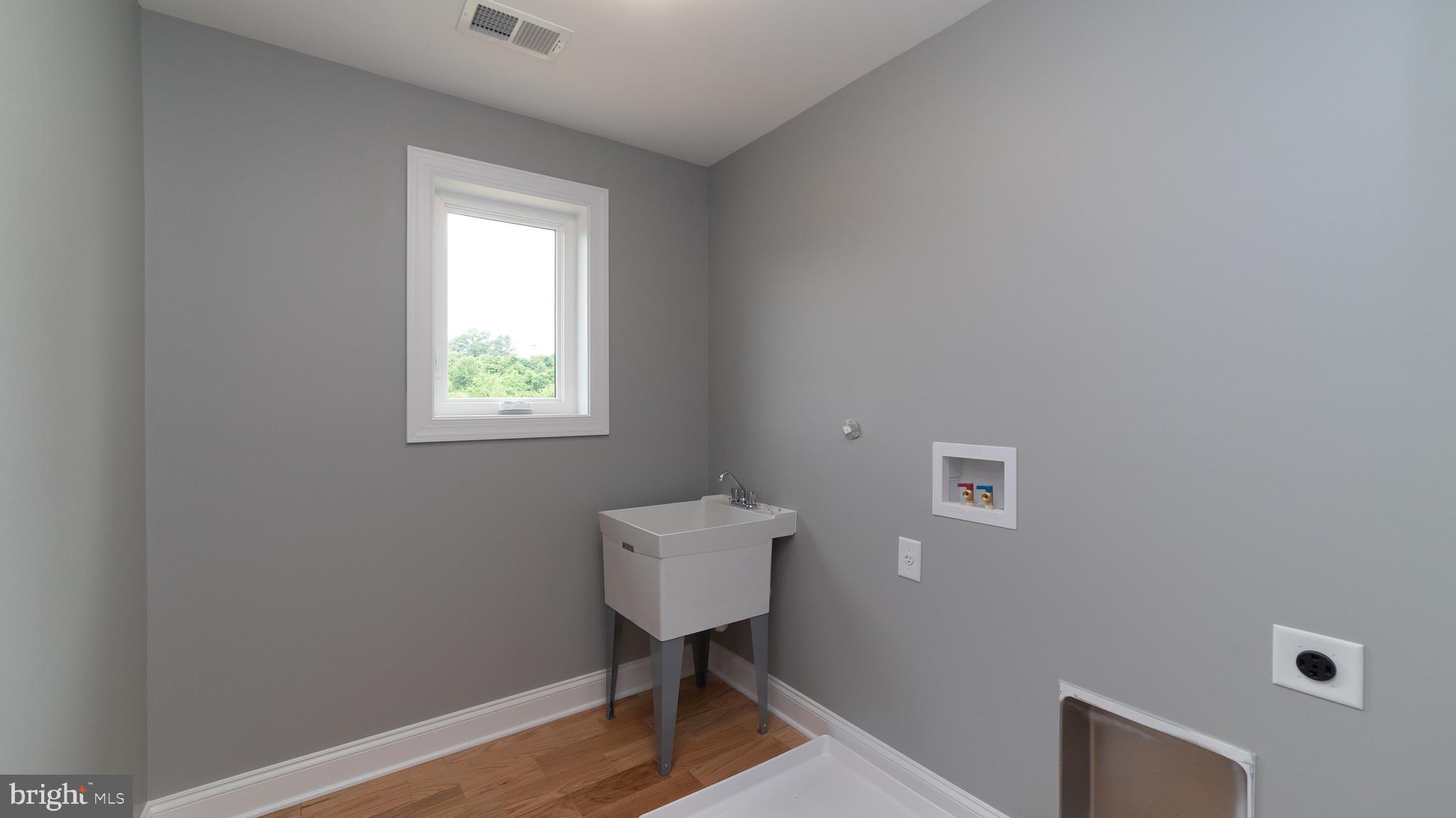 15065 New Windsor Road New Windsor, MD 21776 - Photo 22 of 32 Second floor laundry room.