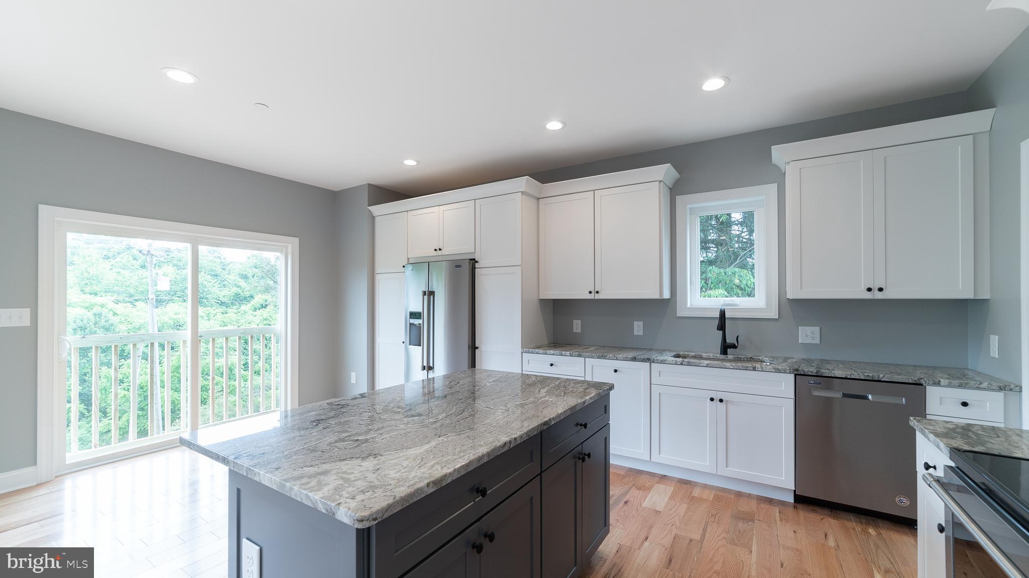 15065 New Windsor Road New Windsor, MD 21776 - Photo 5 of 32 Stainless appliances and granite counter tops.