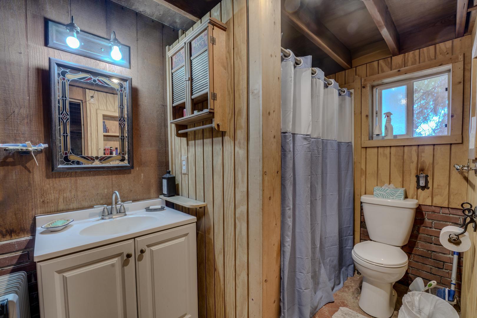 4160 Quatal Canyon Road Maricopa, CA 93252 - Photo 15 of 31 a bathroom with a granite countertop toilet sink and shower