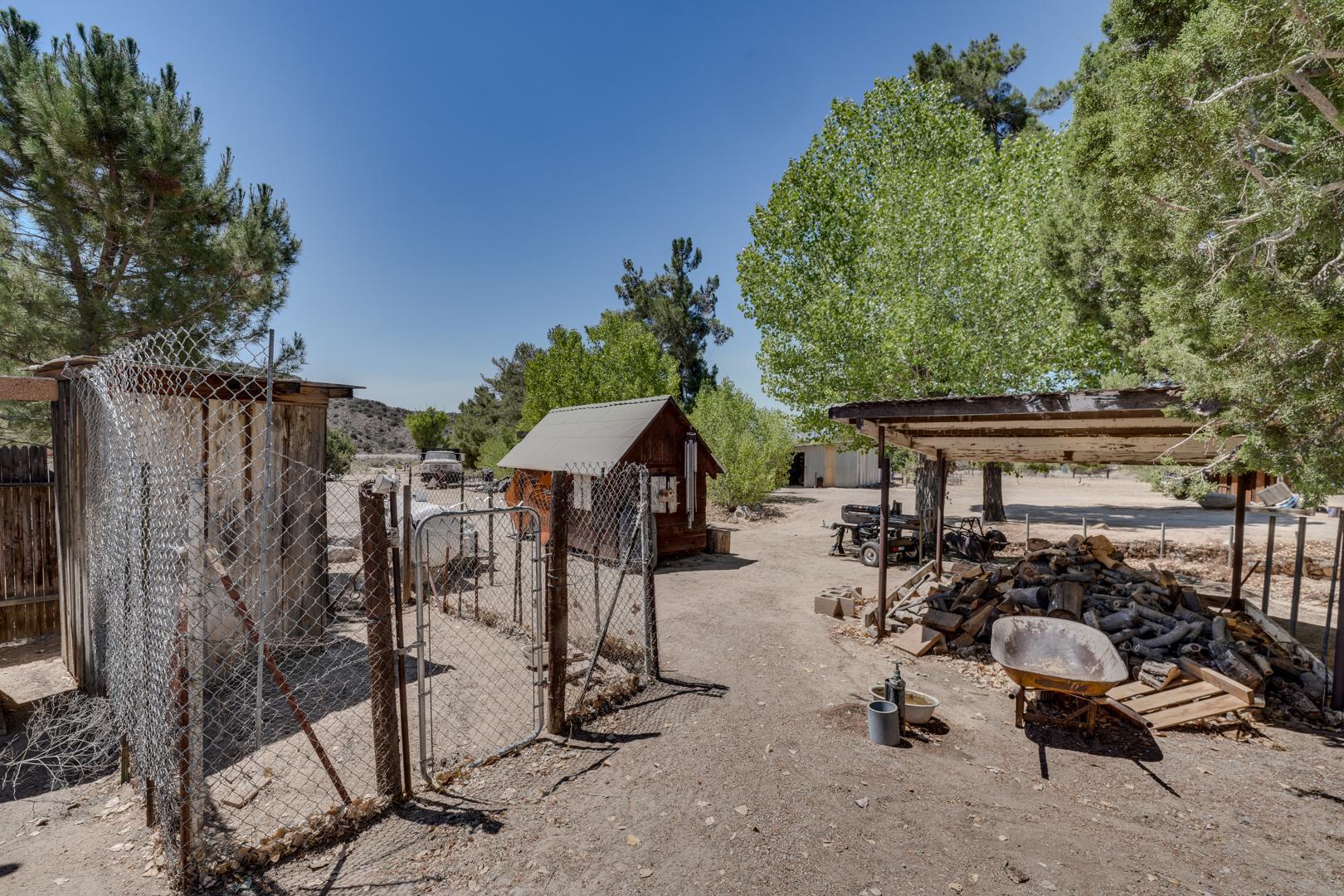 4160 Quatal Canyon Road Maricopa, CA 93252 - Photo 19 of 31 a view of a wooden floor and a view of the house
