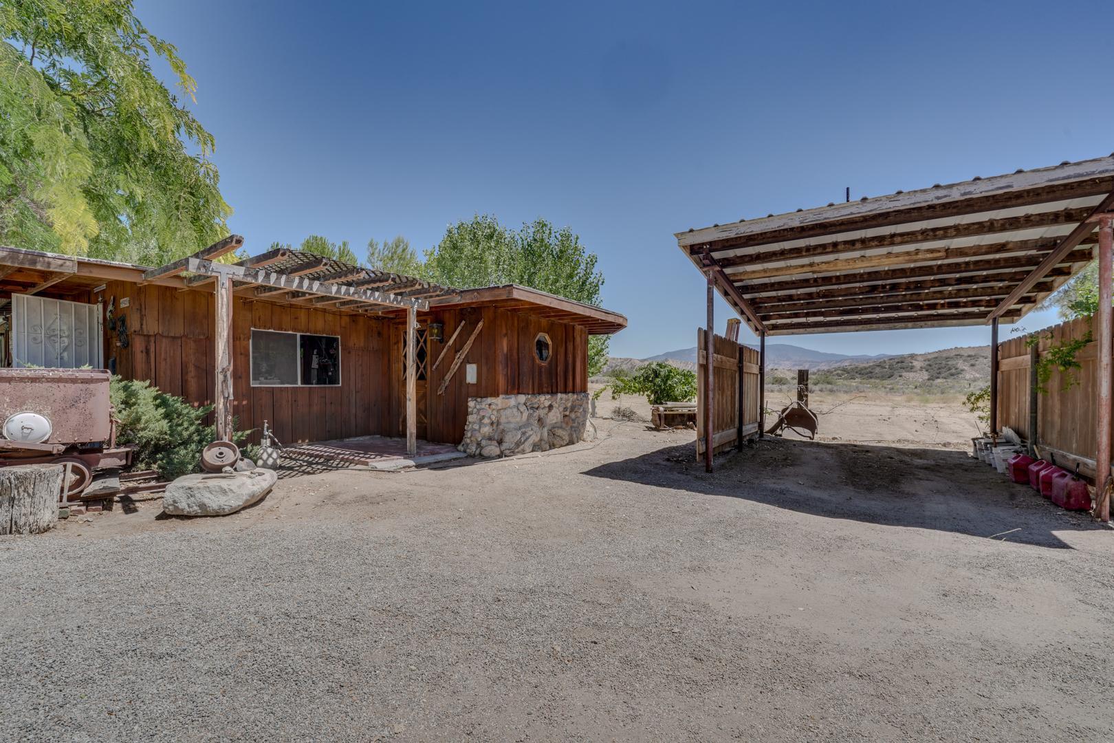 4160 Quatal Canyon Road Maricopa, CA 93252 - Photo 2 of 31 a front view of a house with a garage