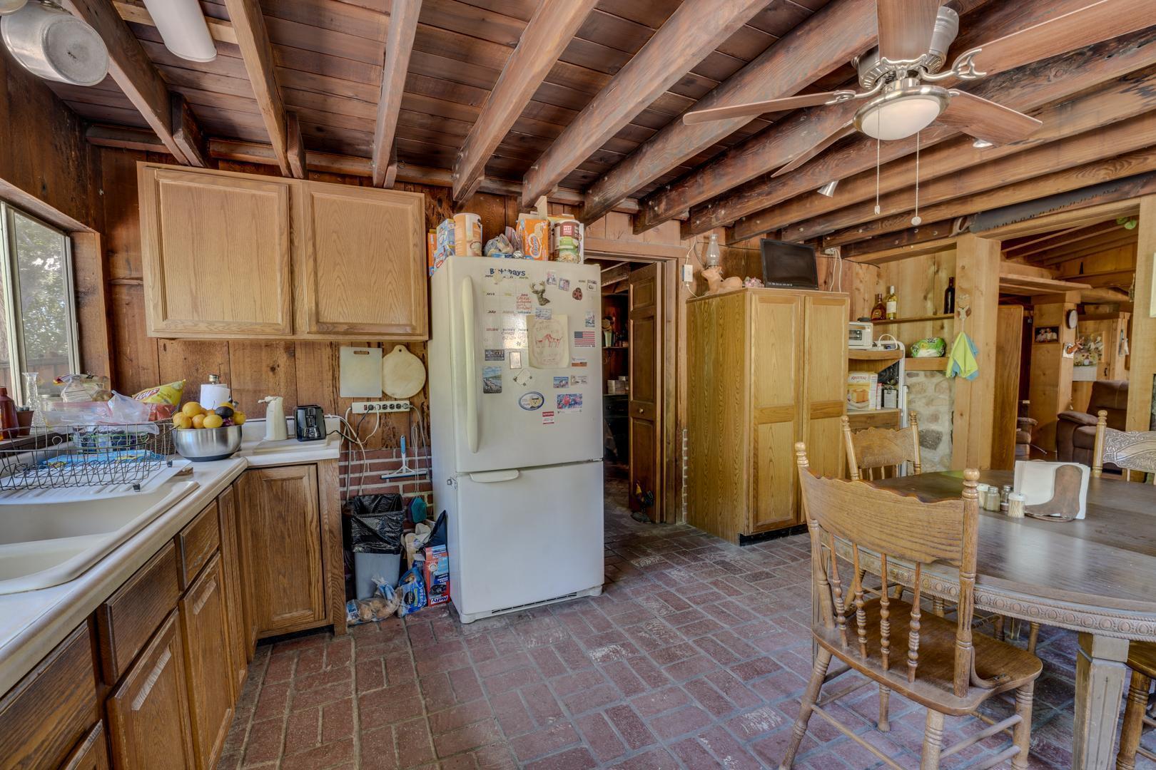 4160 Quatal Canyon Road Maricopa, CA 93252 - Photo 10 of 31 a kitchen with refrigerator and cabinets