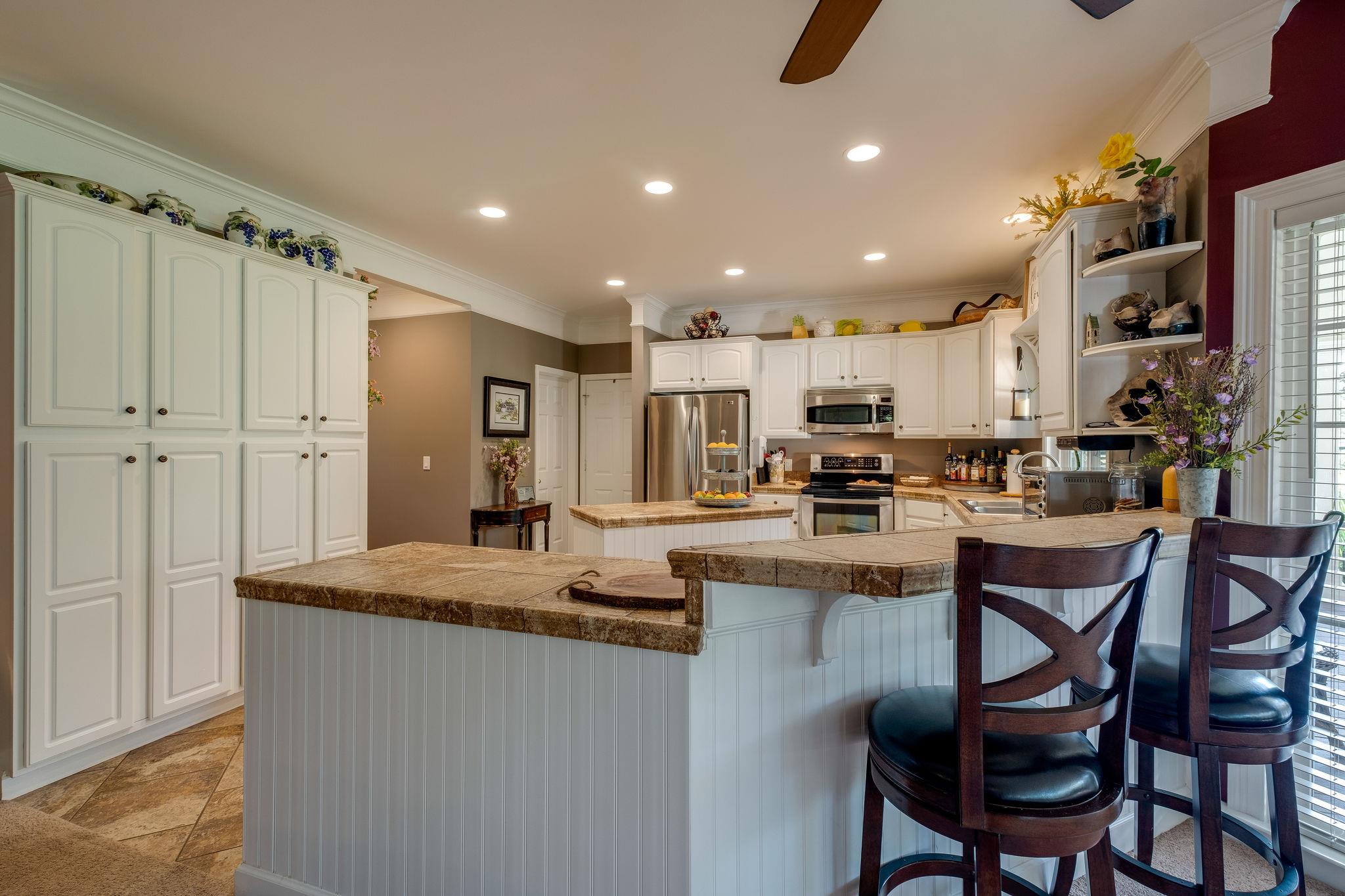 4524 South Carothers Road Franklin, TN 37064 - Photo 8 of 30 RAISED BAR adds additional seating/serving options.
