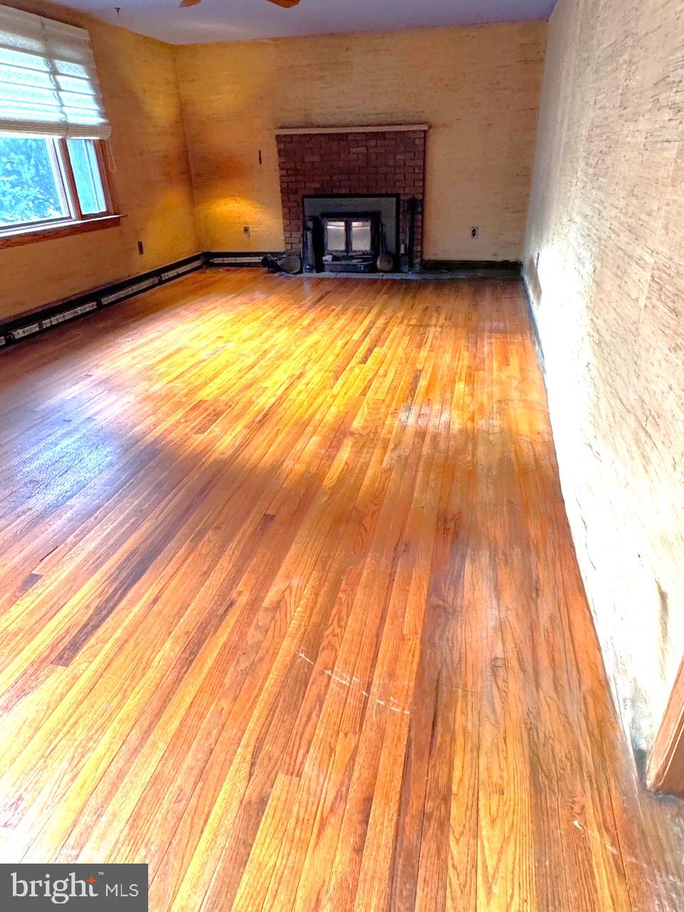 305 Kresson Road Voorhees, NJ 08043 - Photo 8 of 37 a view of empty room with wooden floor