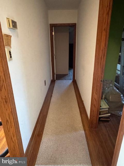 305 Kresson Road Voorhees, NJ 08043 - Photo 9 of 37 a view of a hallway with wooden floor and stairs