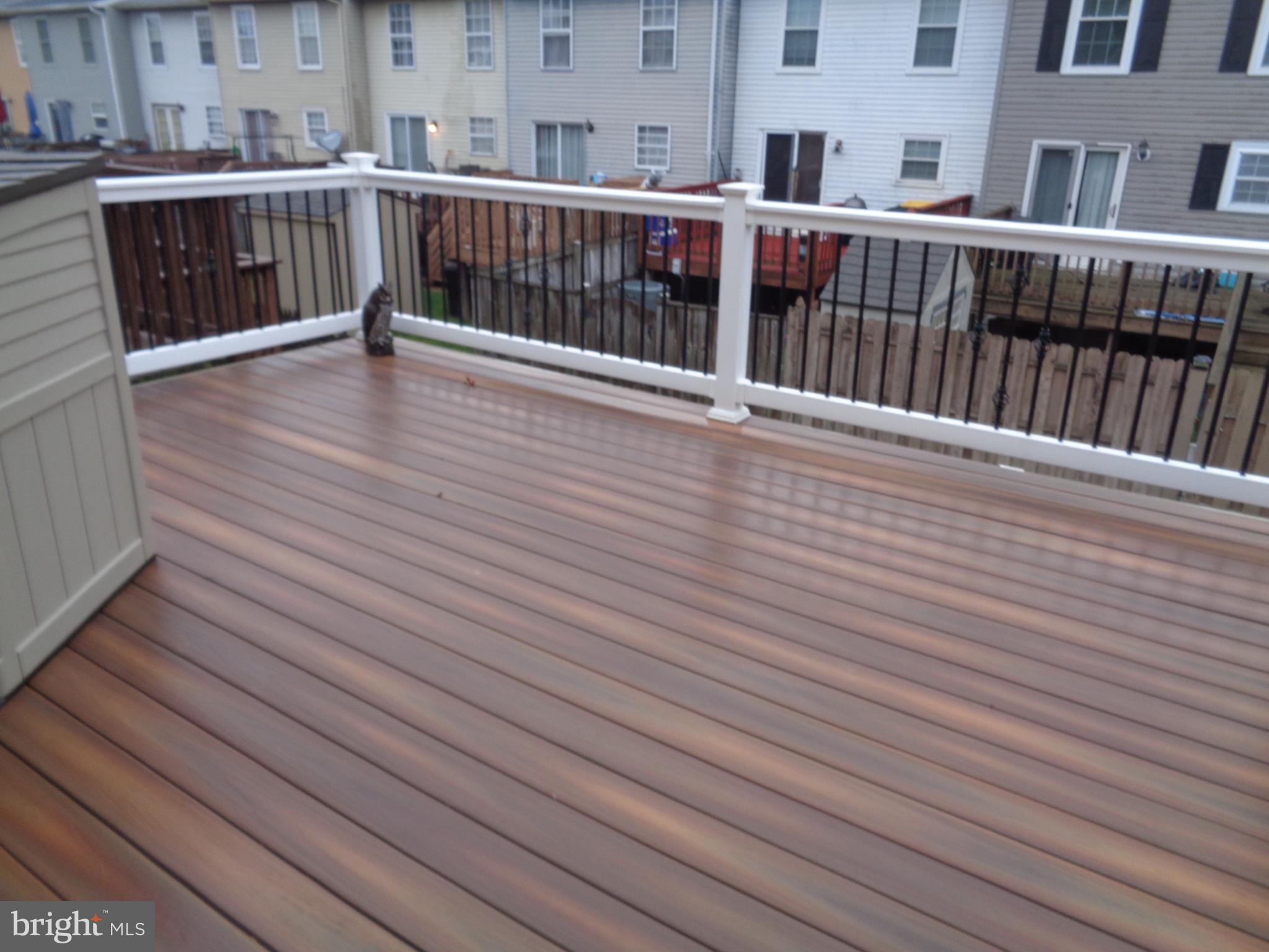 4020 Rustico Road Middle River, MD 21220 - Photo 30 of 59 a view of a balcony with wooden floor