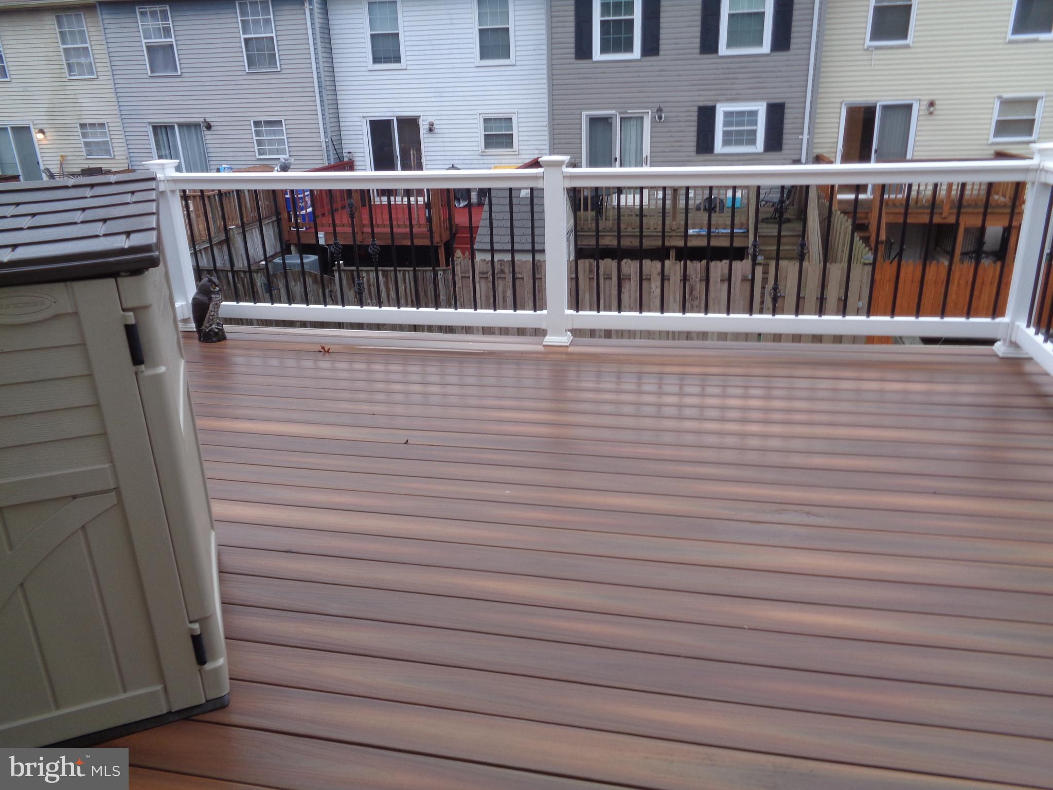 4020 Rustico Road Middle River, MD 21220 - Photo 31 of 59 a view of a balcony with wooden floor