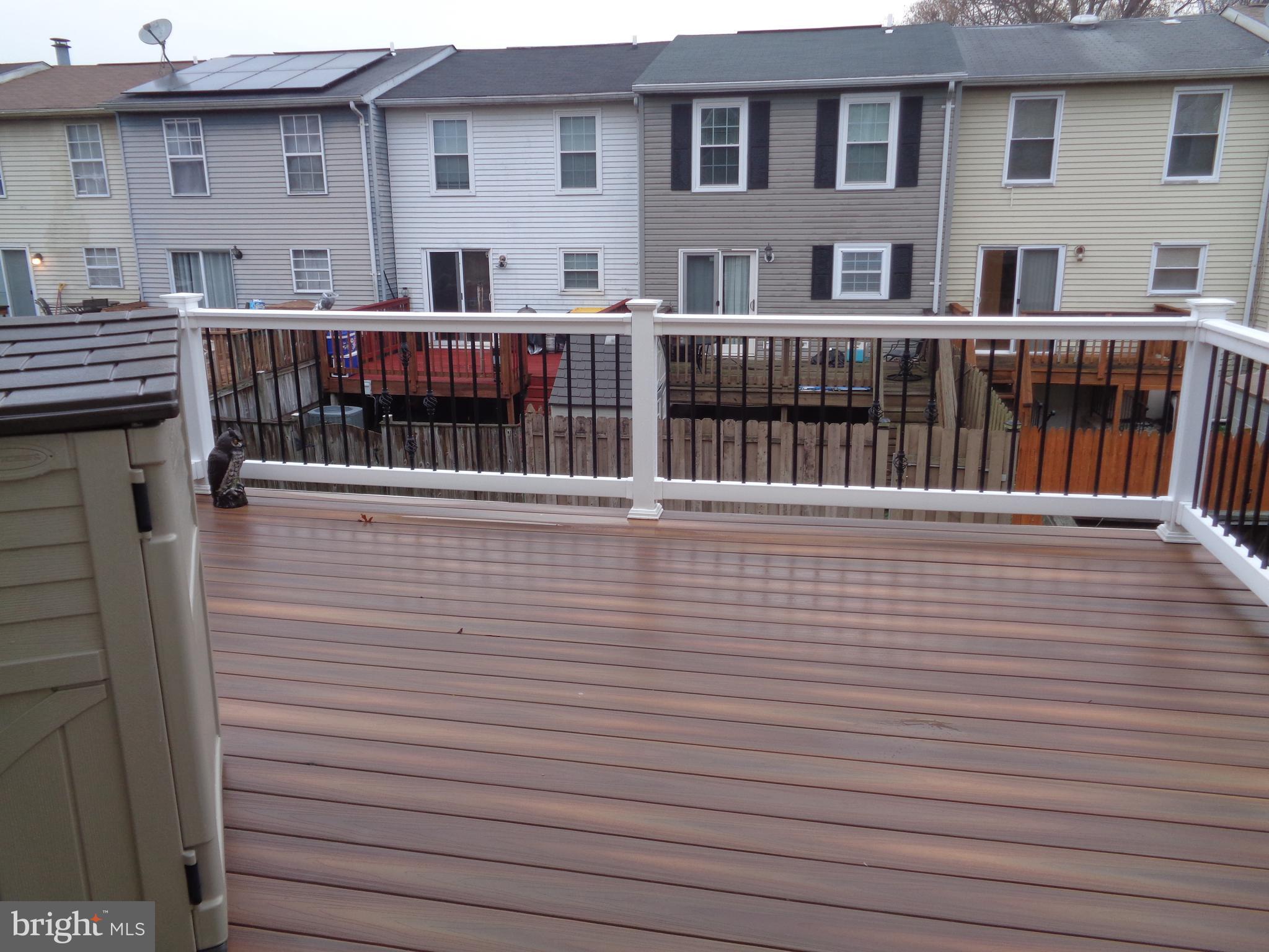 4020 Rustico Road Middle River, MD 21220 - Photo 32 of 59 a view of a brick house with many windows
