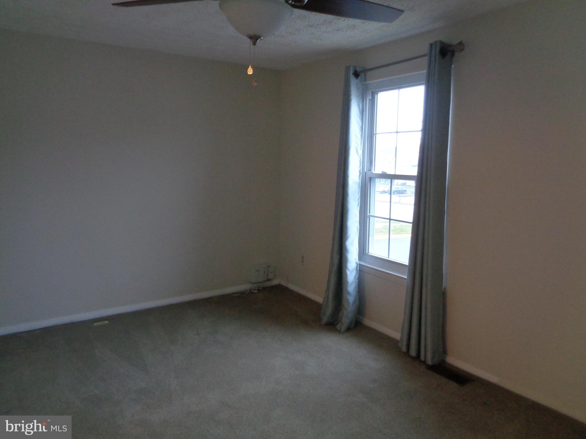 4020 Rustico Road Middle River, MD 21220 - Photo 37 of 59 an empty room with windows