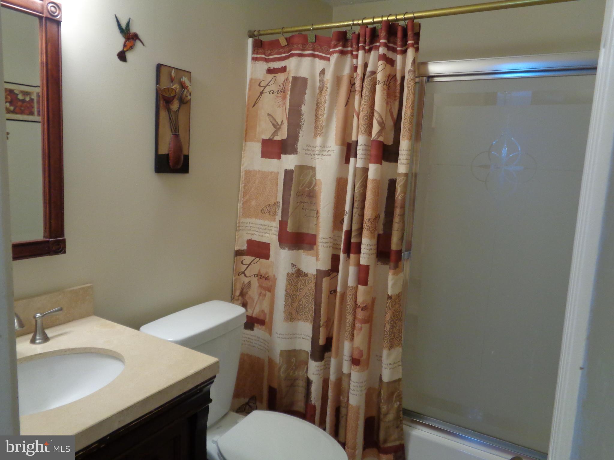 4020 Rustico Road Middle River, MD 21220 - Photo 38 of 59 a bathroom with a sink toilet and shower