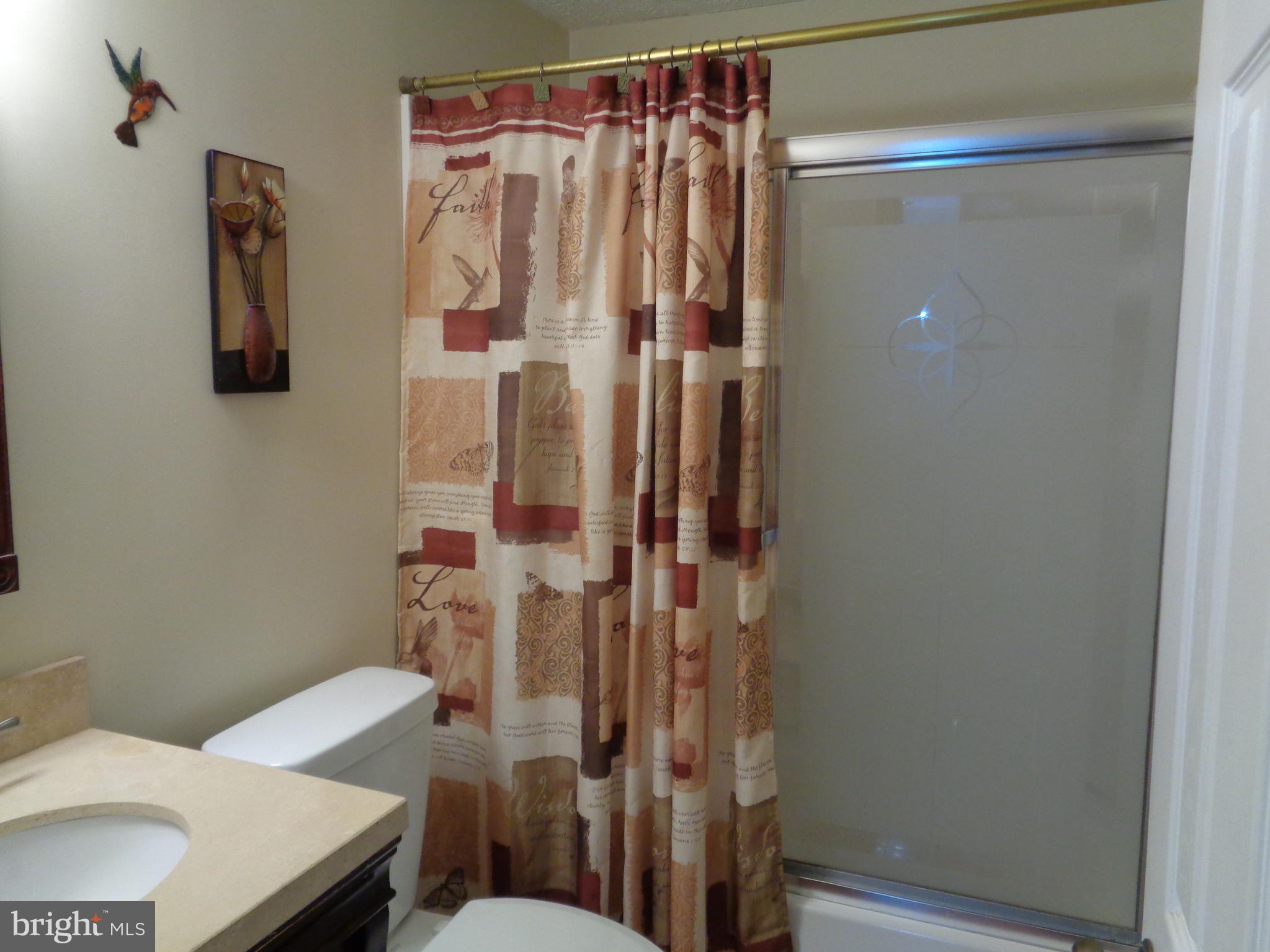 4020 Rustico Road Middle River, MD 21220 - Photo 39 of 59 a bathroom with a sink toilet and shower