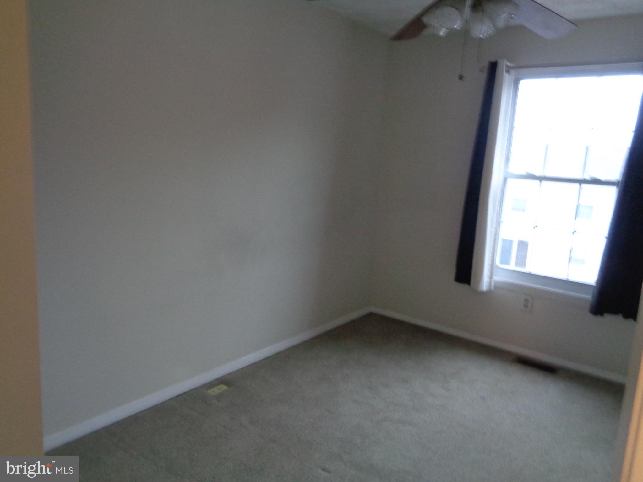 4020 Rustico Road Middle River, MD 21220 - Photo 43 of 59 an empty room with a window