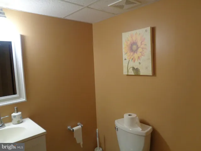 a view of a backyard with sitting area