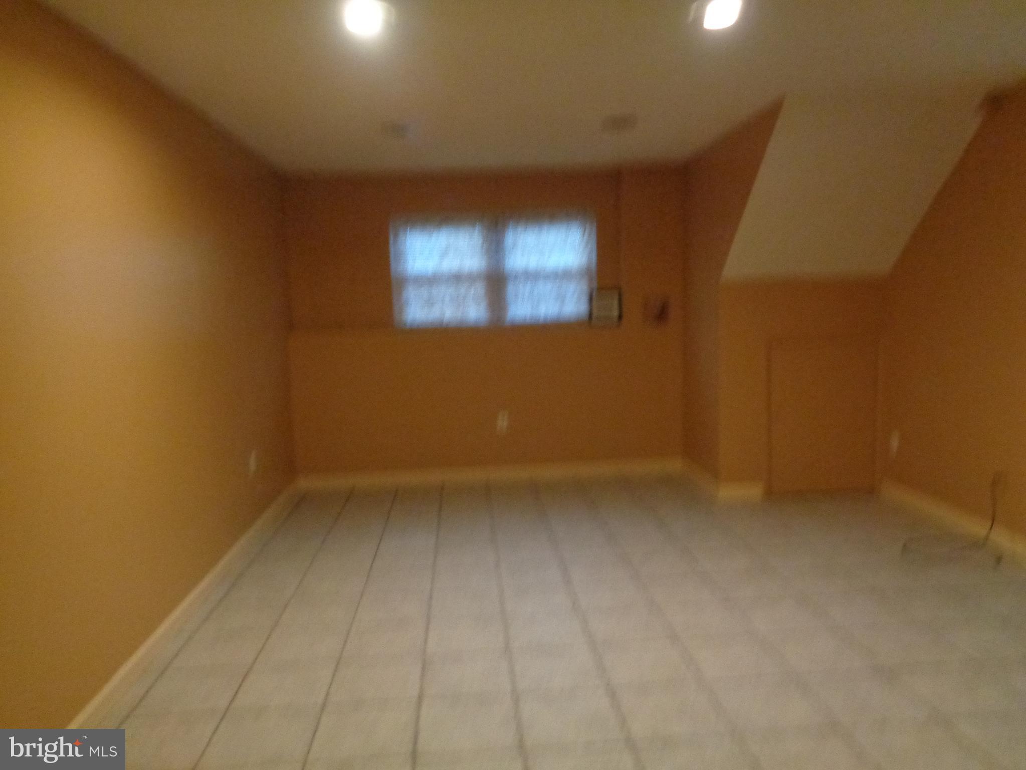 4020 Rustico Road Middle River, MD 21220 - Photo 51 of 59 a view of an empty room with a window