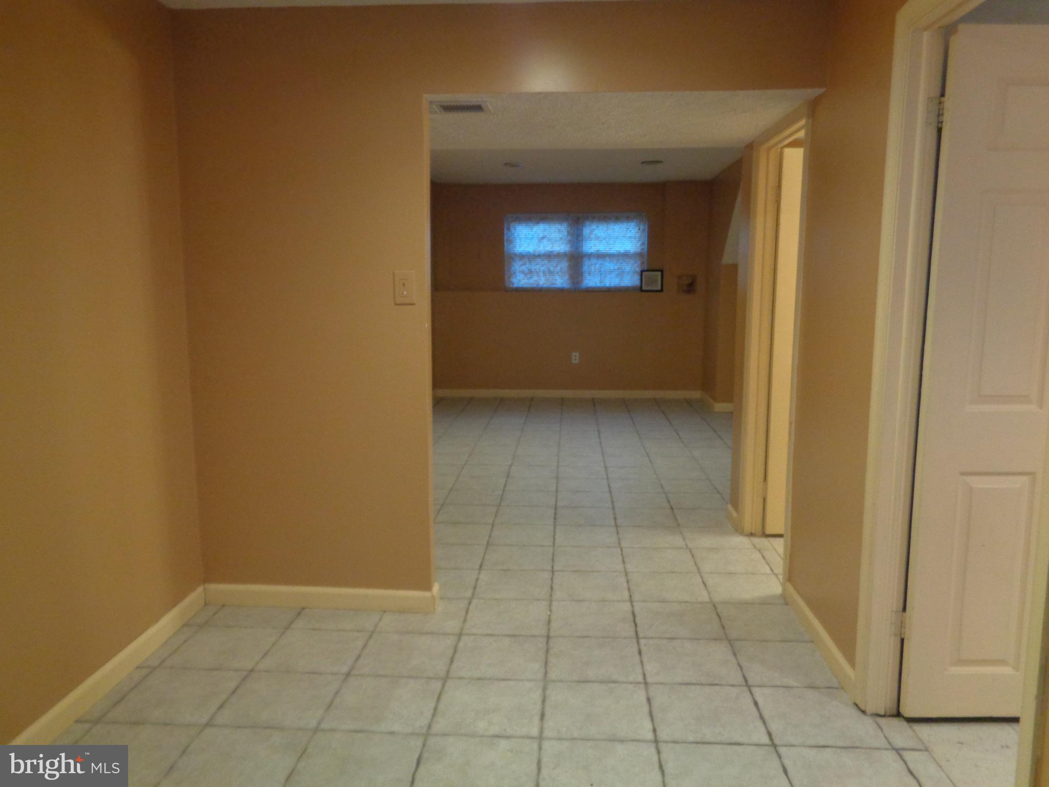 4020 Rustico Road Middle River, MD 21220 - Photo 52 of 59 an empty room with a empty space and windows