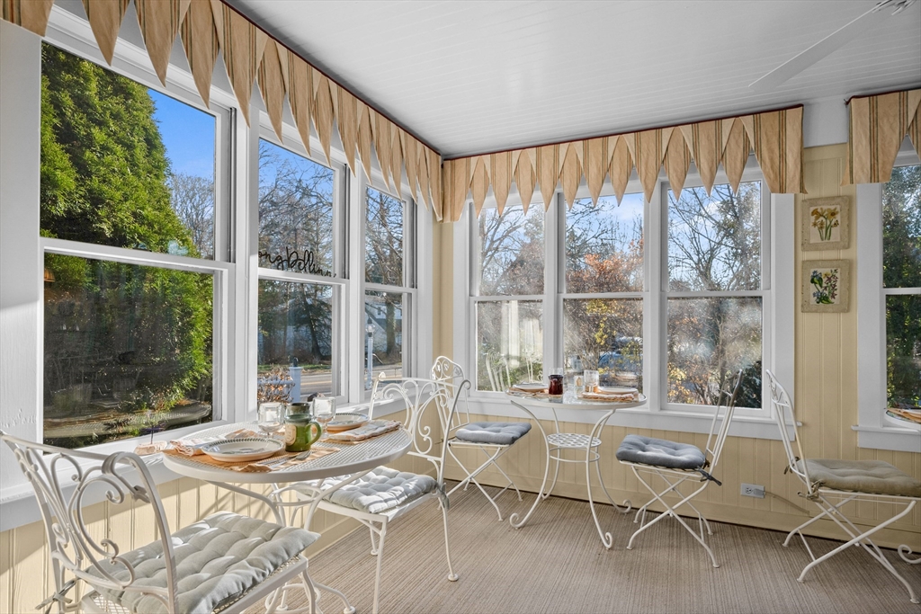 436 South Main Street Barnstable, MA 02632 - Photo 13 of 42 a dining room with furniture and large windows