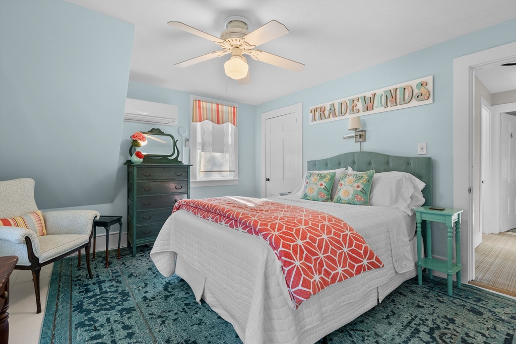 436 South Main Street Barnstable, MA 02632 - Photo 17 of 42 a bed room with a bed and a chair