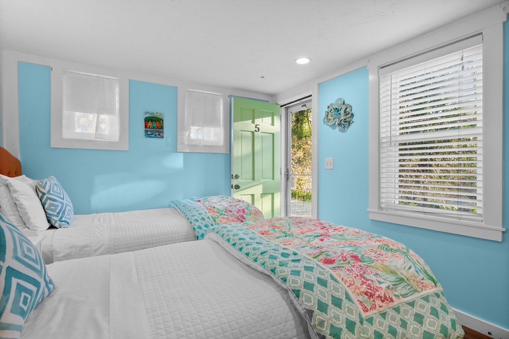 436 South Main Street Barnstable, MA 02632 - Photo 25 of 42 a bedroom with a bed and a window