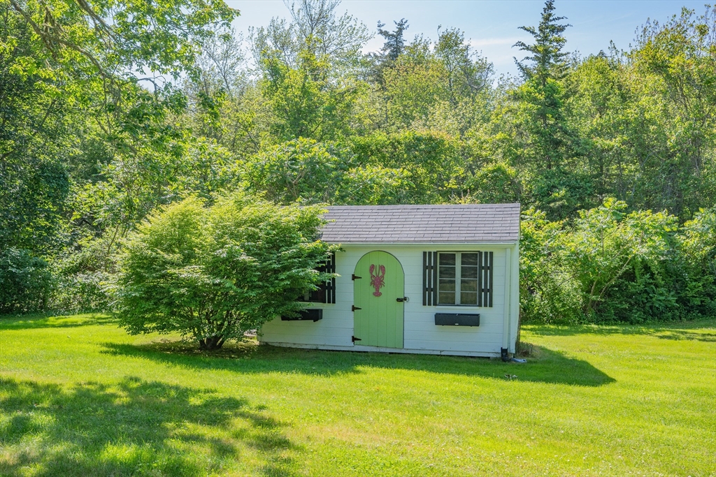 436 South Main Street Barnstable, MA 02632 - Photo 40 of 42 a view of a house with a backyard