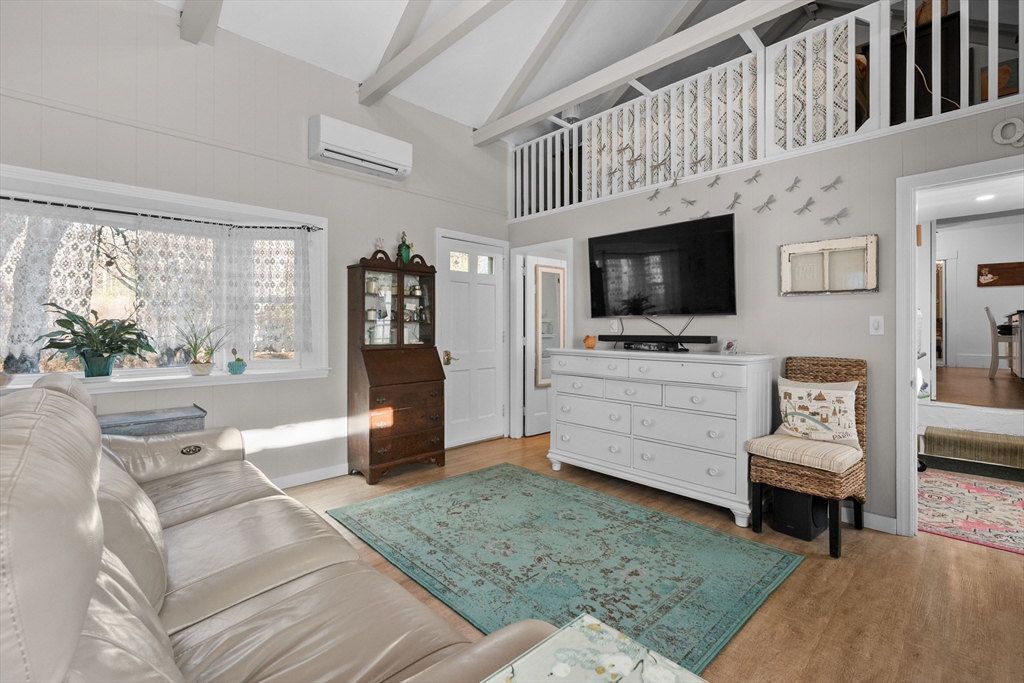 436 South Main Street Barnstable, MA 02632 - Photo 6 of 42 a living room with furniture and a flat screen tv