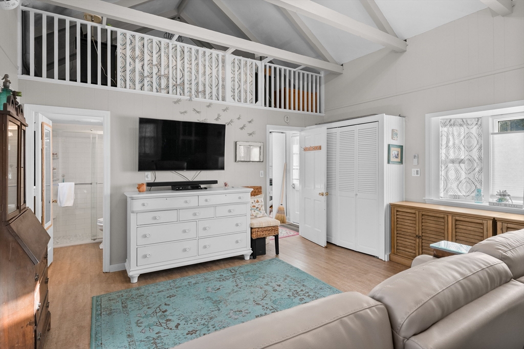 436 South Main Street Barnstable, MA 02632 - Photo 8 of 42 a living room with furniture and a flat screen tv