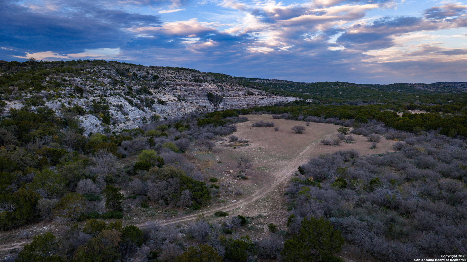 Tbd Us Highway 377 Del Rio, TX 78840 - Photo 21 of 44 a view of a yard with mountains in the background