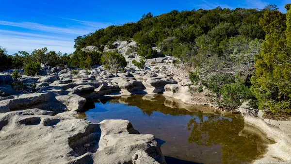 a view of a lake with a mountain