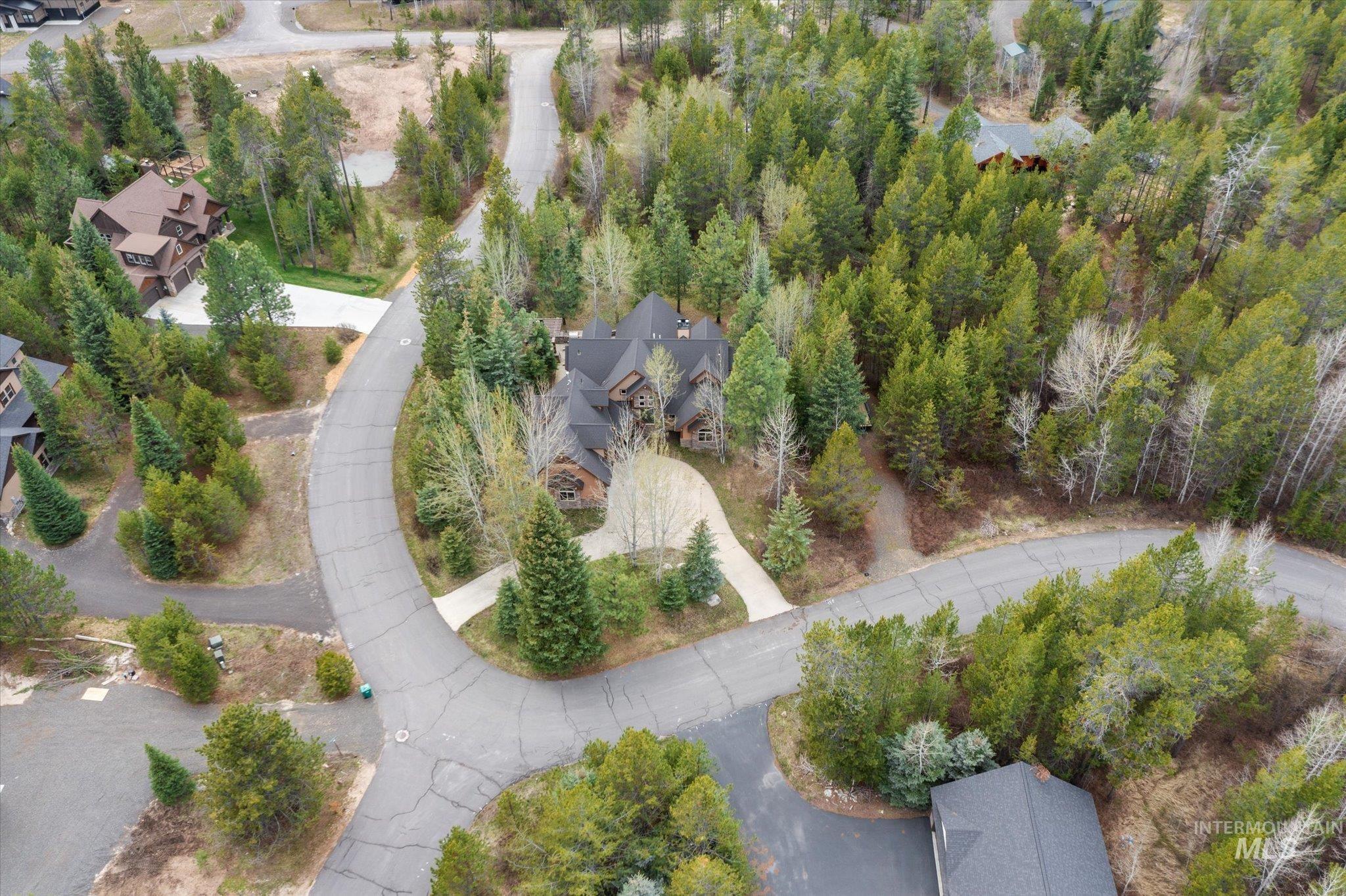 14 Pointe At Goldfork Court Donnelly, ID 83615 - Photo 44 of 49 Wooded residential setting featuring a paved street and multiple properties