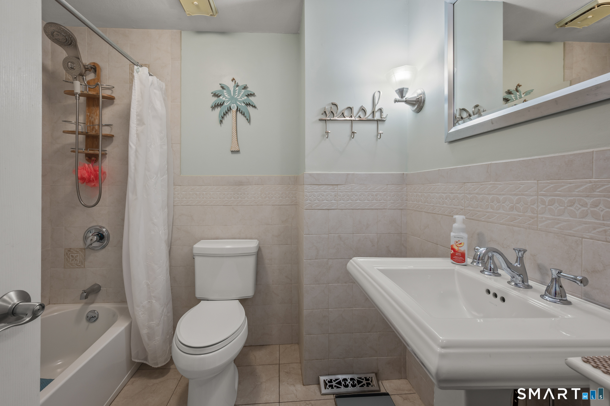 1611 Shepard Avenue Hamden, CT 06518 - Photo 15 of 31 a bathroom with a sink toilet and shower