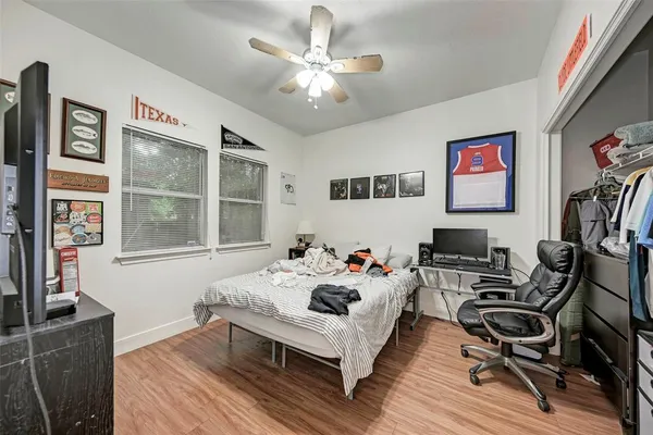 a kitchen with stainless steel appliances a sink and cabinets