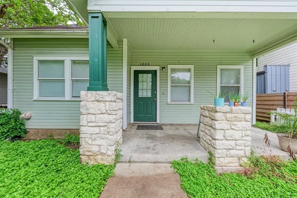 a view of house with outdoor space