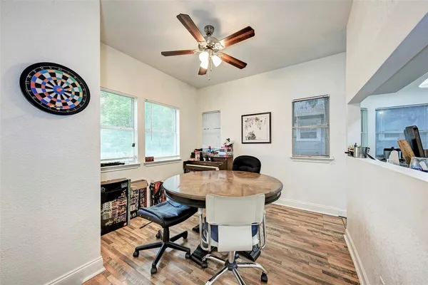 a workspace with furniture and window