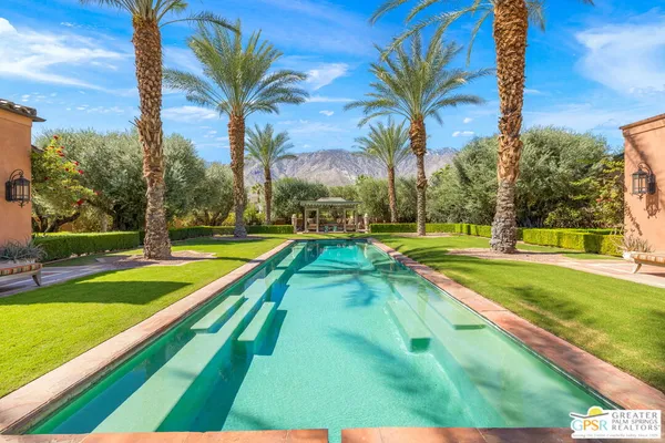 a view of a house with a swimming pool