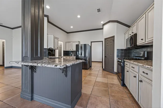 a view of an entryway with chandelier