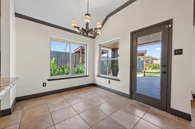 a view of a bathroom with dual sinks