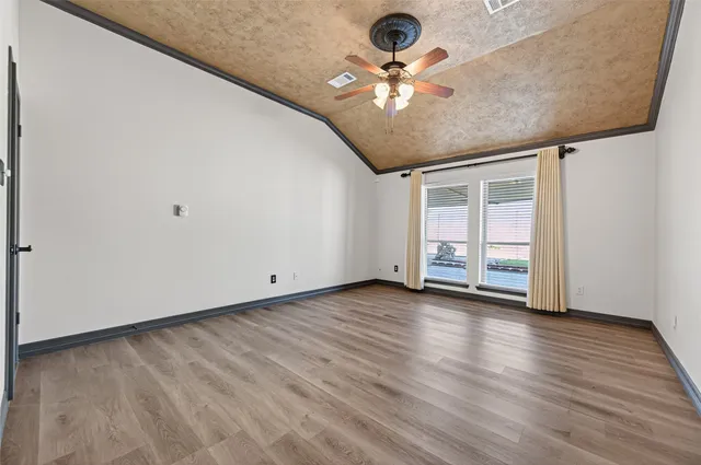 a bathroom with a granite countertop sink a mirror and a